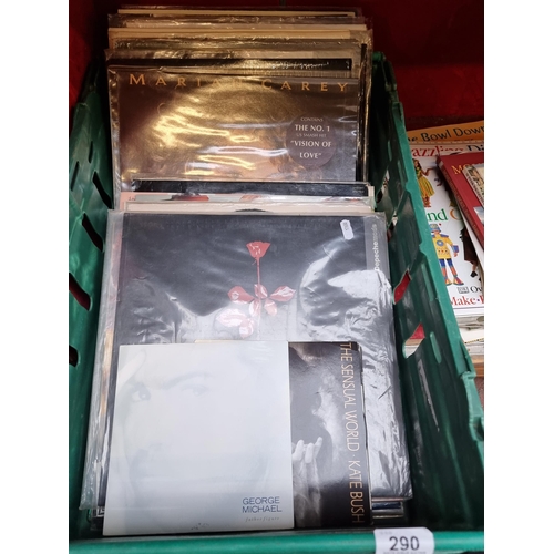 290 - A crate containing dozens of vinyl records and singles by artists such as Depeche Mode, George Micha... 