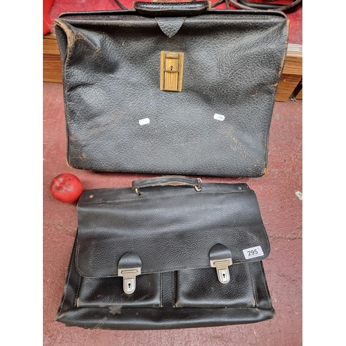 295 - Two vintage genuine leather satchel / briefcases with handles to top.