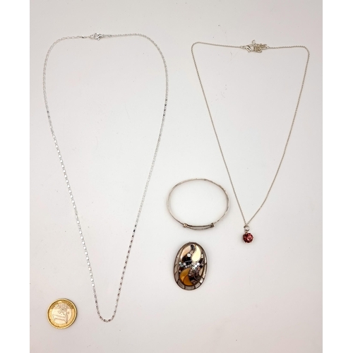 41 - A collection of four silver items, consisting of a lovely Albalone and Mother of Pearl pendant, a ch... 