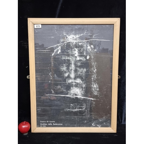 78 - A large print showing the Shroud of Turin, reading 