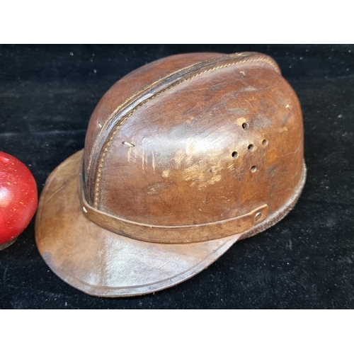 97 - A rare vintage genuine leather racing helmet dating to c. 1930s. A hard helmet crafted from leather ... 