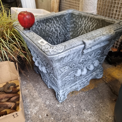 881 - A large square reconstituted stone outdoor planter in a grey finish.