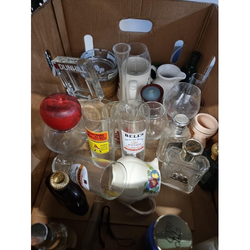 893 - A large mixed lot consisting of glassware, ashtrays and perfume bottles. Good box