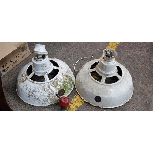 898 - A pair of large vintage industrial ceiling lamp shades in a white enamel finish.