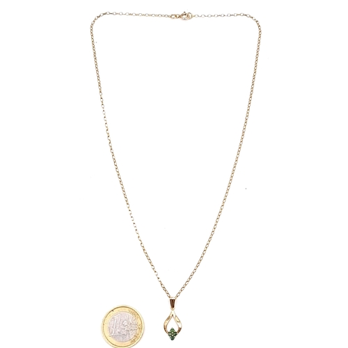 906 - Star Lot : A beautiful 9 carat gold vintage Emerald stone pendant necklace and chain. With a length ... 