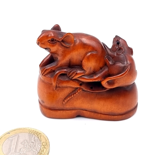 912 - A stunning vintage boxwood Netsuke figure, in the form of two lucky rats perched on a boot.  With th... 