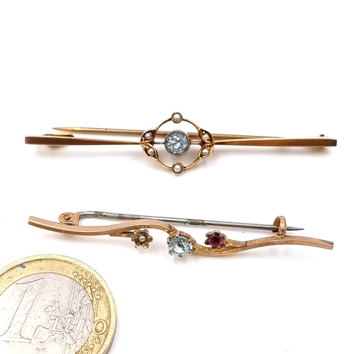 918 - Two  gold antique brooches, each featuring fabulous designs which includes Aquamarine, Seed Pearls a... 