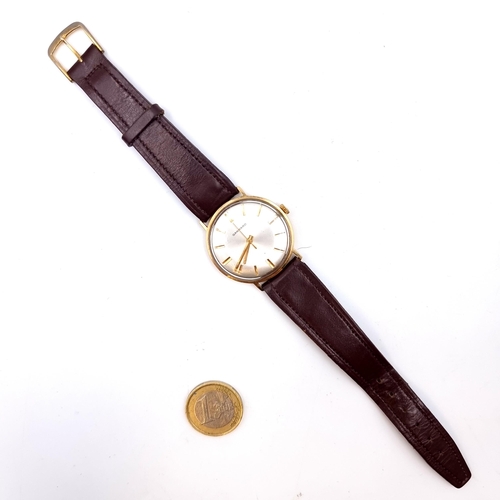 919 - Star Lot : A super 9ct Gold Garrard gentleman's vintage wrist watch, set with baton dial and sweep s... 