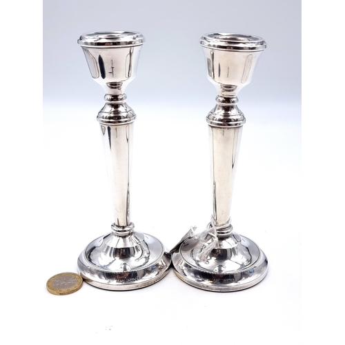 959 - A beautiful pair of  sterling silver candlesticks marked Birmingham and dating to 1978. In very good... 