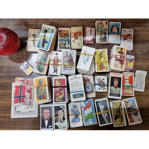 945 - A  very large collection of vintage cigarette cards by brands such as Will's, John Player and Craven... 