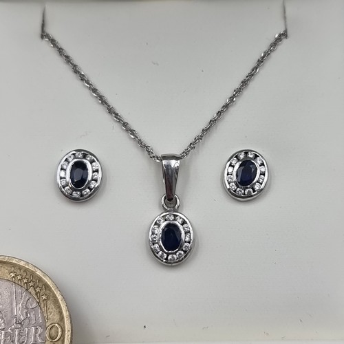 972 - Star Lot : A gorgeous 9 carat white gold necklace and earring set with b=sapphires and diamonds. . T... 