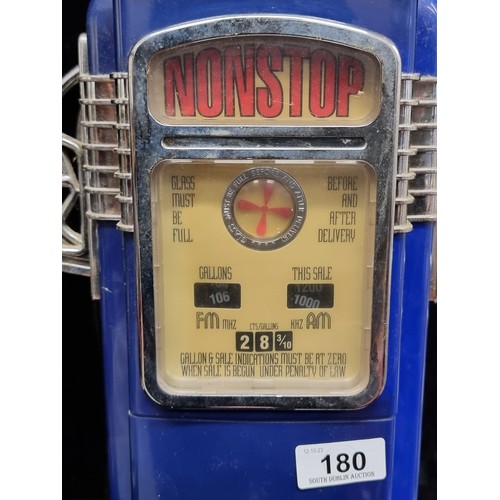 180 - A wonderful tall vintage style radio in the form of an American gasoline pump. H55cm. It lights up a... 