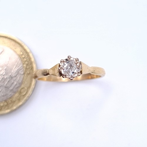 9 - Star Lot : A fabulous bright cut Diamond solitaire 18 carat gold ring, set with sun burst halo surro... 