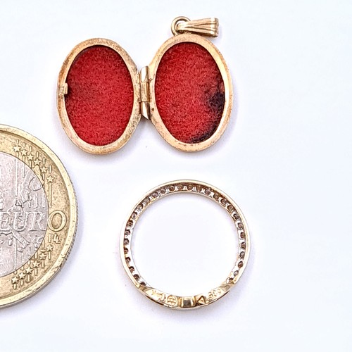 22 - Two items, including a 9 carat gold hinged locket, set with incised floral detail. Together with a 1... 