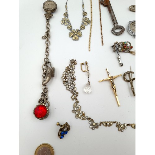 32 - A large collection of assorted vintage jewellery unchecked items, including watches, brooches, penda... 