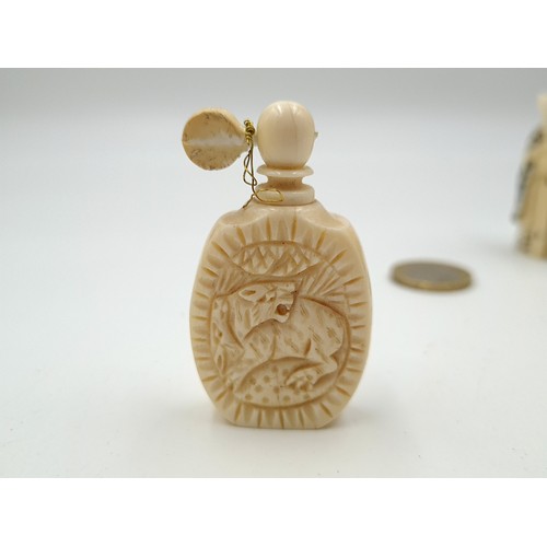 33 - Two late 19th century bone items, including a snuff bottle. Together with a finely hand carved bone ... 