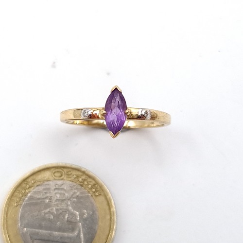 46 - A beautiful Marquise cut 9 carat gold Amethyst and Diamond ring. Ring size: S. Weight: 1.57 grams.