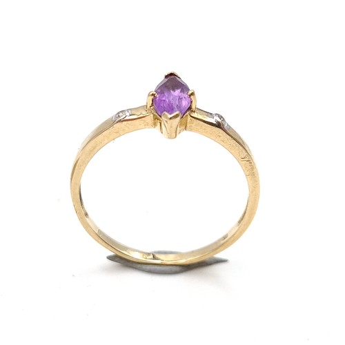 46 - A beautiful Marquise cut 9 carat gold Amethyst and Diamond ring. Ring size: S. Weight: 1.57 grams.