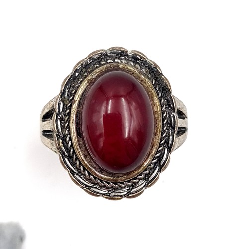 55 - A collection of two rings, including a vintage Cabochon blood stone ring. Size: S. Weight: 5.27 gram... 