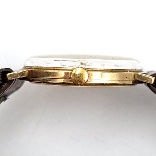 919 - Star Lot : A super 9ct Gold Garrard gentleman's vintage wrist watch, set with baton dial and sweep s... 