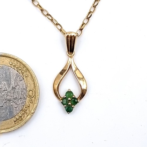 906 - Star Lot : A beautiful 9 carat gold vintage Emerald stone pendant necklace and chain. With a length ... 