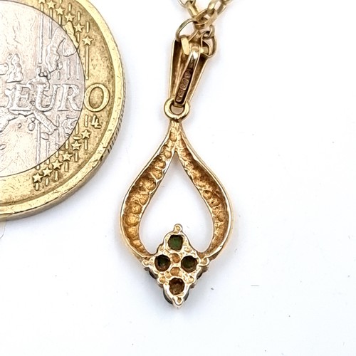 906 - Star Lot : A beautiful 9 carat gold vintage Emerald stone pendant necklace and chain. With a length ... 