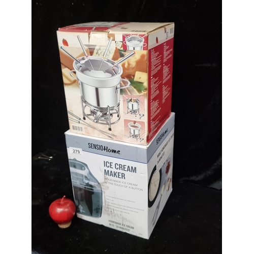 279 - Two brand new kitchenware items including a Sensio Home 1.4 litre ice cream maker and a stainless st... 