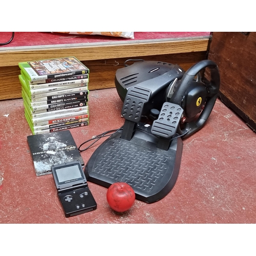 338 - An XBox 360 Thrustmaster Ferrari 458 RW race gaming set comprising of a steering wheel and a pedal p... 