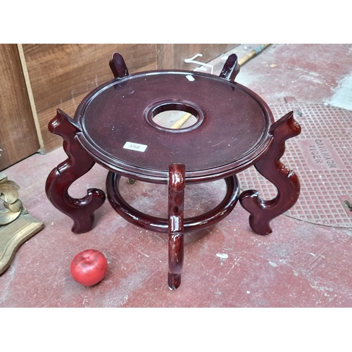 358 - A very large  stylish wooden Chinese style plant stand with curvilinear feet. Would take an extra la... 