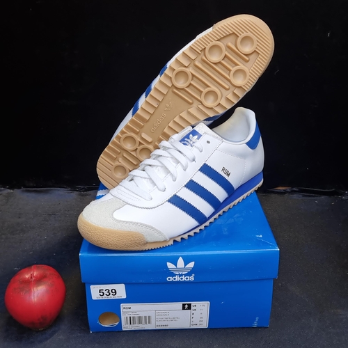 A pair of brand new Adidas Rom trainers in white and blue. Size UK 11. We are honoured to be asked t