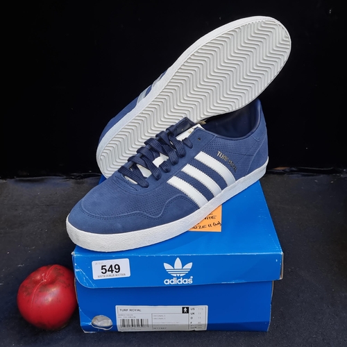 549 - A pair of brand new Adidas Turf royal blue and white trainers. Size UK 11. We are honoured to be ask... 