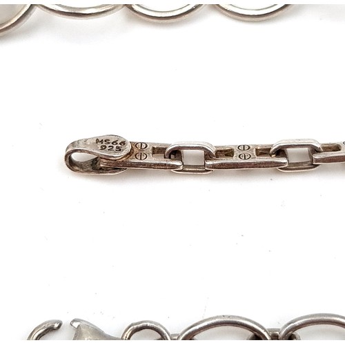 480 - A collection of three sterling silver bracelets, in an array of designs and styles.