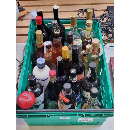 686 - A crate containing a large number and variety of liquor and spirits including Irish Mist, Highland B... 