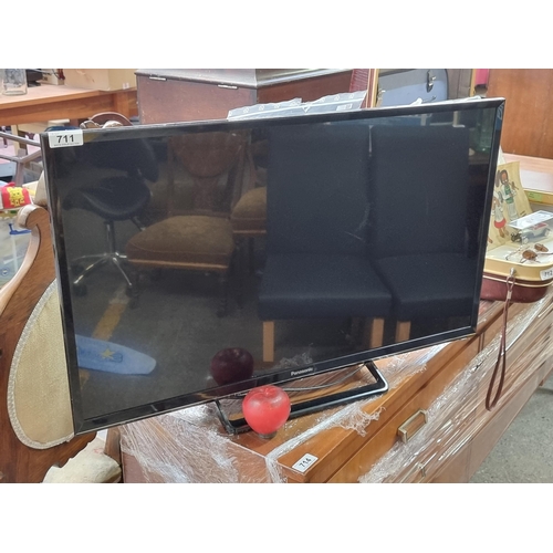 711 - A Panasonic LED Satellite TV model no. TX-32FS503B. Accompanied by original remote control and opera... 