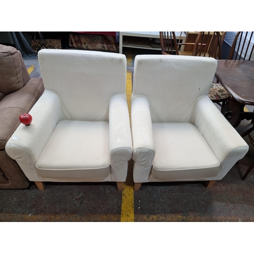 720 - A pair of armchairs from Ikea ready for upholstering or get a couple of slip cover from Ikea held on... 