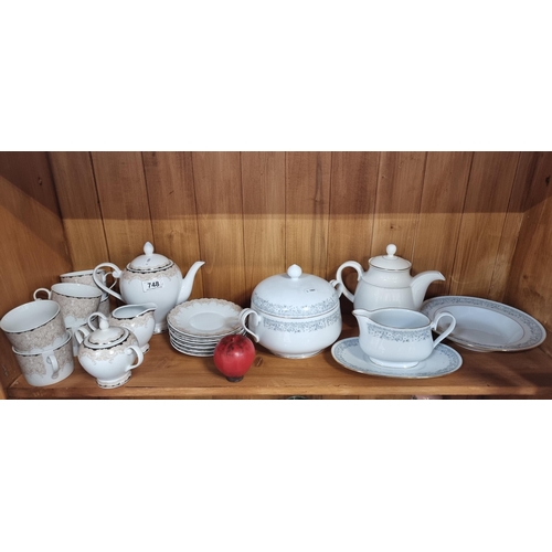 748 - A sixteen piece Delphi porcelain coffee set. Along with an R.C. Island Noritake vegetable terrine an... 