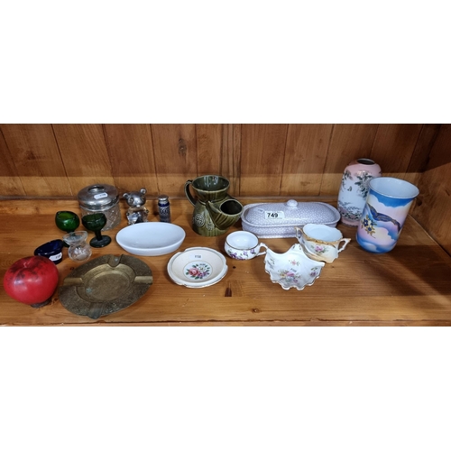 749 - A mixed lot of ceramics, particaula  interest the coloured glass victorian eye baths and the two nic... 