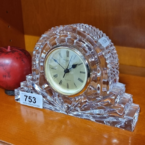 753 - A large Waterford Crystal clock with quartz dial. In good condition with acid mark to base.