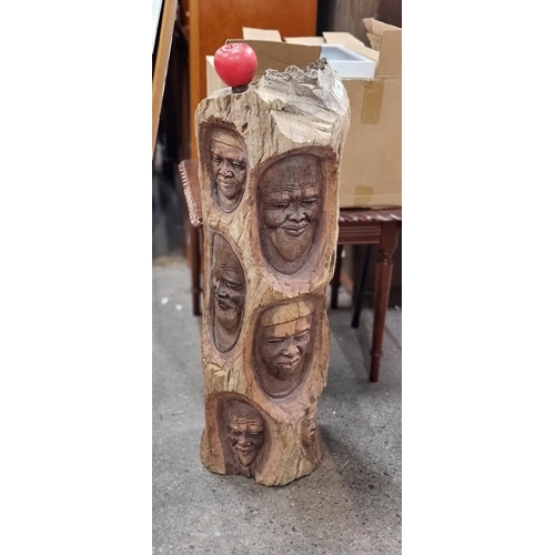 757 - Star Lot : A large and very heavy teak wood carving totem sculpture. Amazing detailed faces througho... 