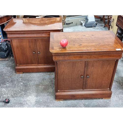 767 - A pair of very handsome Mid Century bedside cabinets with a shelf each and a hidden drawer for valua... 