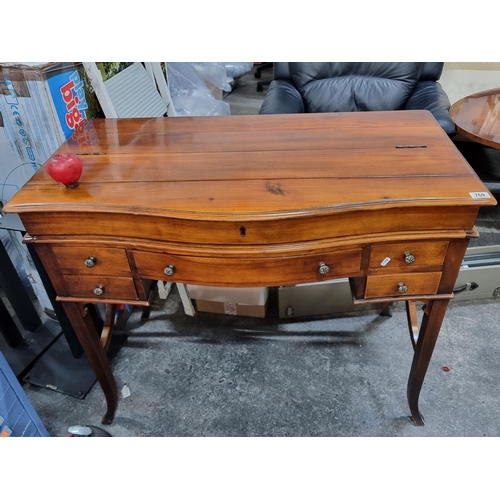 769 - A very elegant late 20th century bow front bureau with the top opening to reveal desk pull-out desk ... 