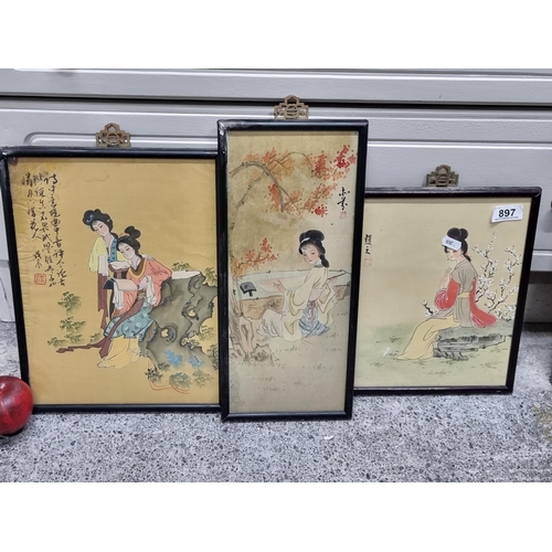 897 - Three lovely original Chinese paintings on silk featuring ladies wearing traditional garments in gar... 