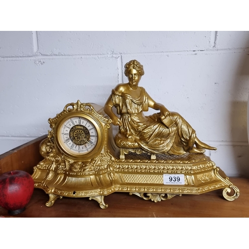 939 - A very attractive French style mantle clock with a female Roman figure, cast metal construction with... 