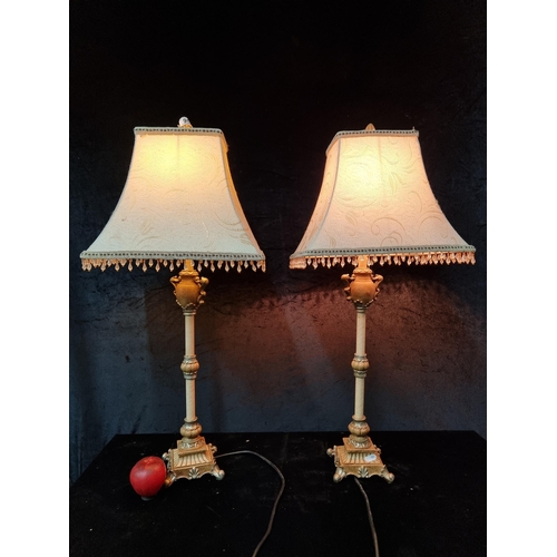 952 - A pair of designer bijou Kirkwood table lamps with beaded fringe and cream embroidered shade. In goo... 