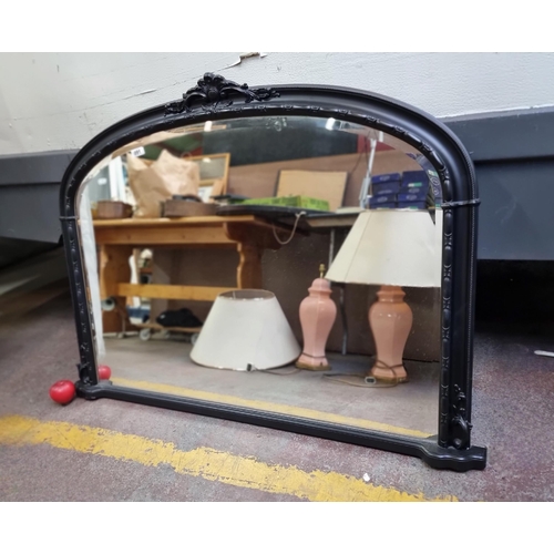 1091 - A fabulous large beveled over mantle mirror in a matte black finish. H89cm x W120cm.