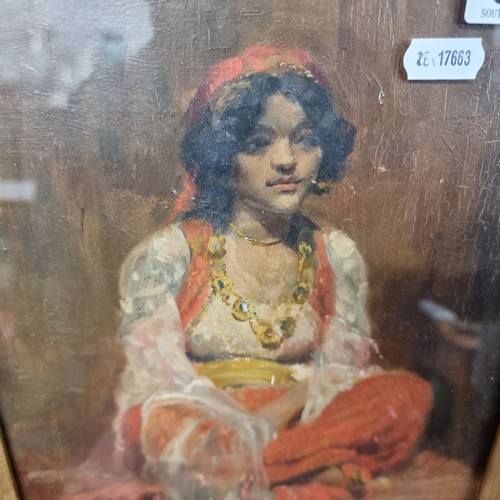 63 - Star Lot : A fabulous early 20th century oil on board painting, showing a portrait of a young woman,... 