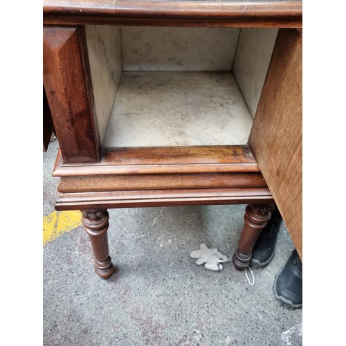 703 - Star Lot : A very unusual early 20th century cabinet/table with compartment lined with marble, dropl... 