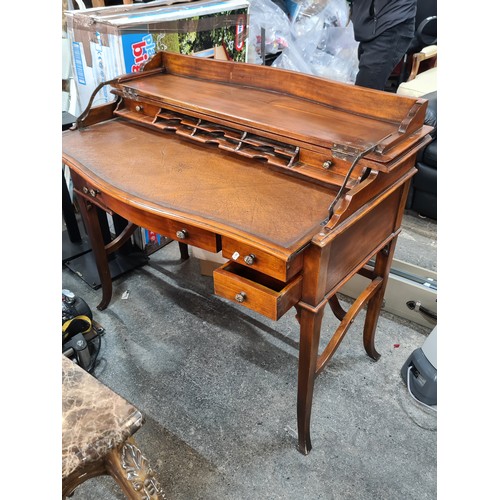 769 - A very elegant late 20th century bow front bureau with the top opening to reveal desk pull-out desk ... 