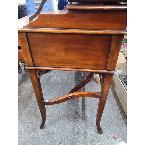 769 - A very elegant late 20th century bow front bureau with the top opening to reveal desk pull-out desk ... 