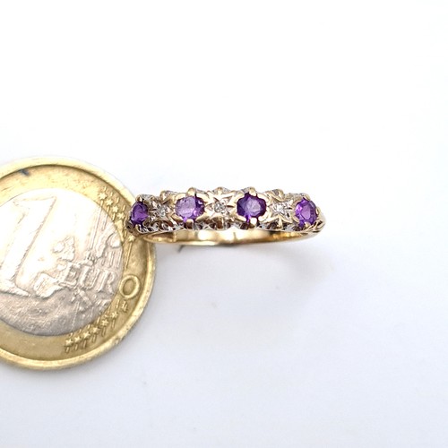 23 - Star lot : A show stopping antique  9 carat gold Amethyst and Diamond ring, Featuring four vivid Ame... 